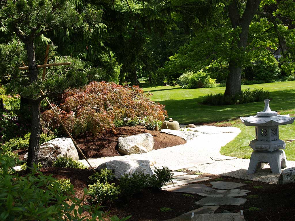 Japanese stone walkway of Japanese rock garden design .