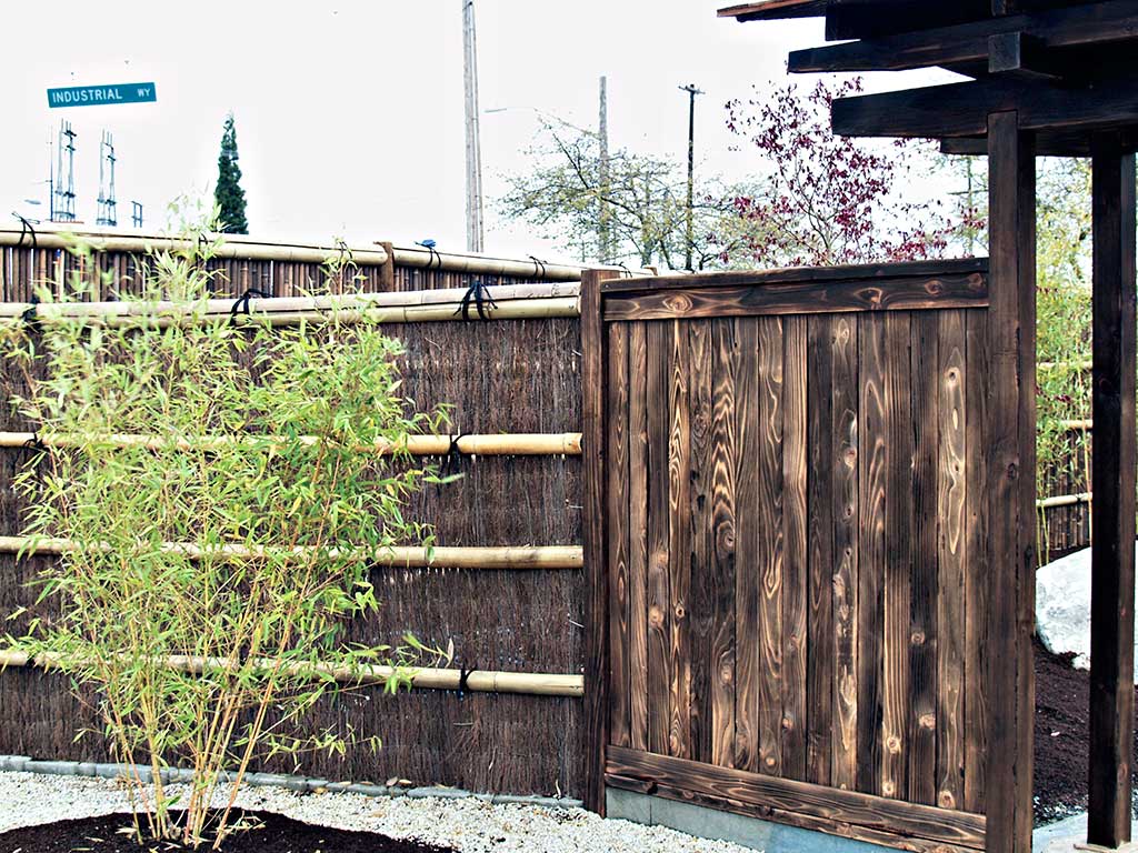 Combination of bamboo and woodwork fence.